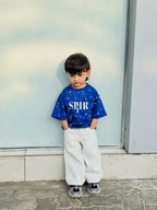 Cool Blue Tee & Classic White Pants Look